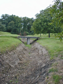 The old canal route over the summit now disappears into the trees. 