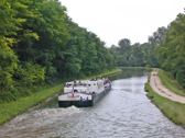 Hotel barges travel the Canal de Briare; this is "Le Bon Vivant".