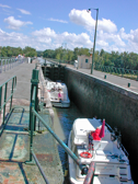 The boats are entering the bridge-level lock. The lock is over 38 meters long and can accomodate three 10-12 meter boats.